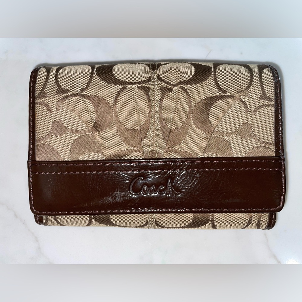 Coach bifold monogram wallet button closure